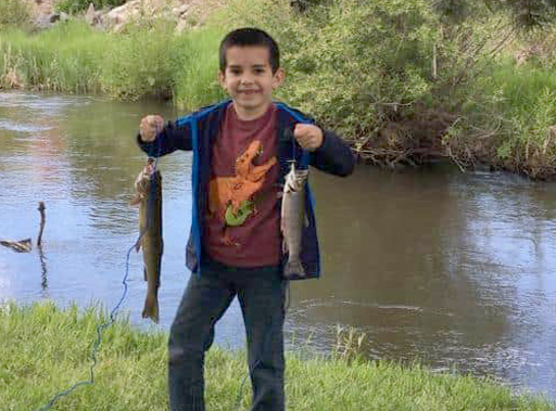 Boy fishing near Firehouse Campground