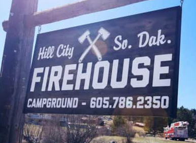 Firehouse Campground sign